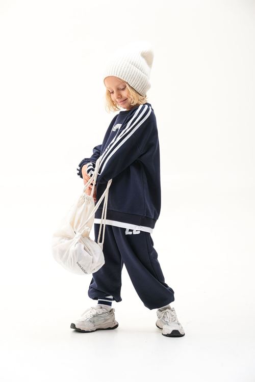 NO22 KOL ŞERİTLİ BEYAZ ETEK DETAYLI 4-12 YAŞ EŞOFMAN TAKIMI