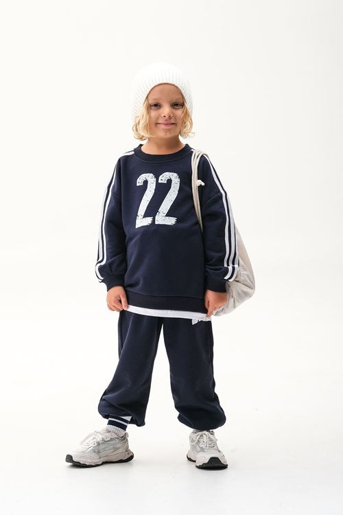 NO22 KOL ŞERİTLİ BEYAZ ETEK DETAYLI 4-12 YAŞ EŞOFMAN TAKIMI